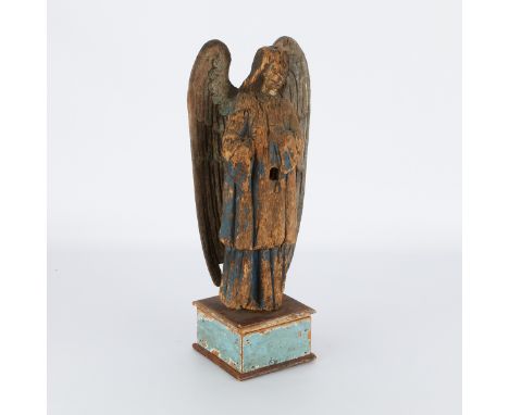 South American polychromed and carved wooden santos sculpture of an angel. Retaining some of the blue polychrome decoration a