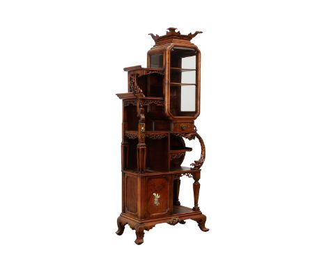 Gabriel Viardot (French, 1830-1906). Aesthetic movement curio cabinet. The superstructure with a glazed beveled shaped door a