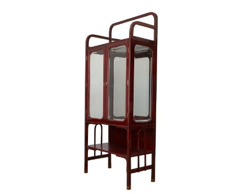 Austrian Secessionist display cabinet or salon box with two glass doors that open to an interior storage compartment over a s