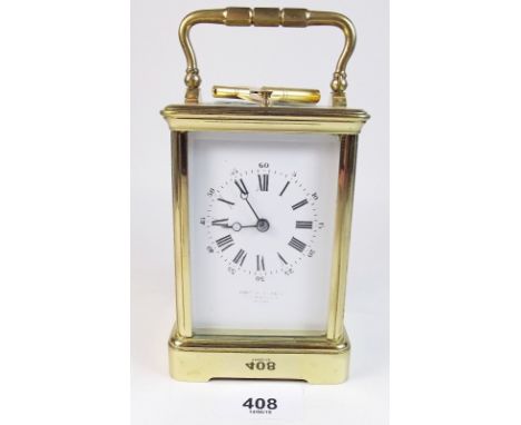 A 19th century brass striking carriage clock with repeater - 12cm