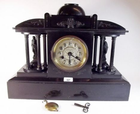 A Victorian black slate mantel clock - glass a/f