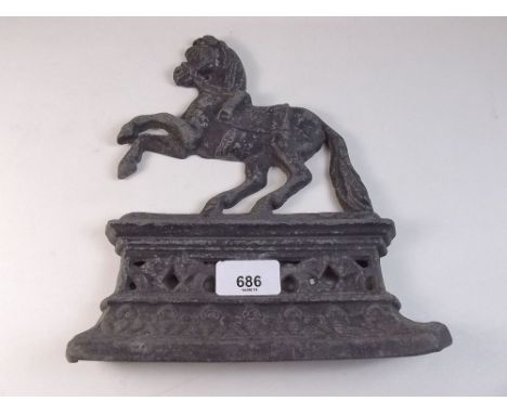 A Victorian cast iron horse plaque