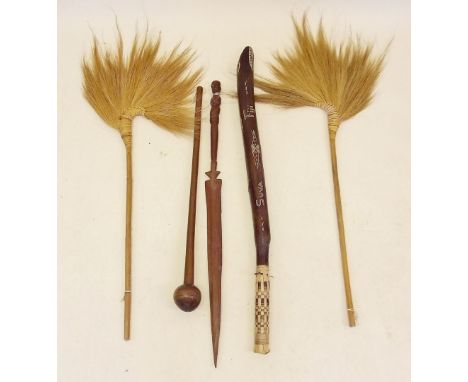 A pair of African grass fans, a didgeridoo, African club and spear