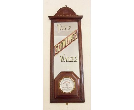 A 'Schweppes Table Waters Gold Medal' mirror with barometer 93 x 31cm