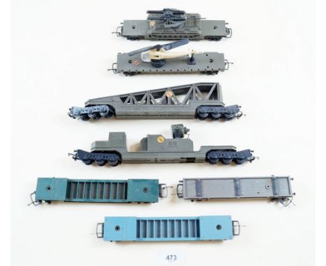 Seven Triang Army wagons and transporters including Battle Space Search Light Wagon, Nato Operating Helicopter wagon etc