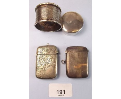 A silver napkin ring, silver pill box and two silver vestas