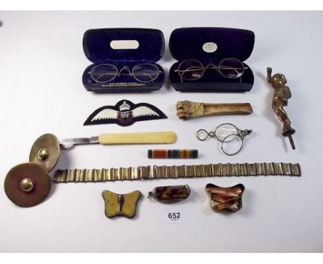 A bone and steel bleeding knife, and a 'Prisoner of War' carved bone scoop tool and various other collectables