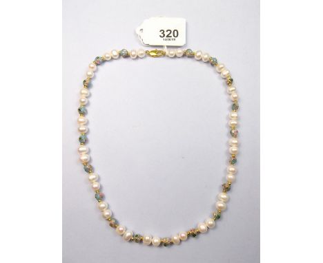 A freshwater pearl and green enamel necklace