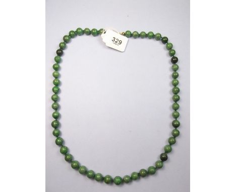 A jade bead necklace