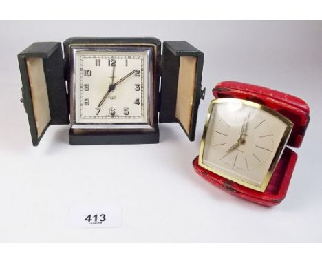 A Smiths travel alarm clock and Junghans one