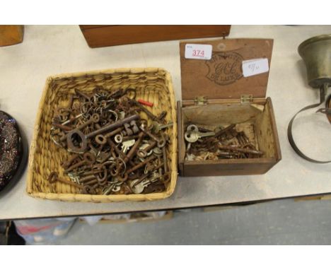 Wooden box of vintage keys