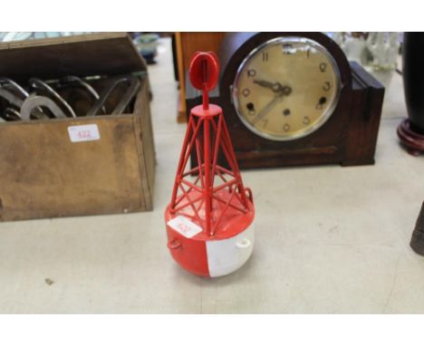 Cast model of a bouy