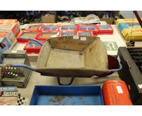 Vintage childs toy wheelbarrow