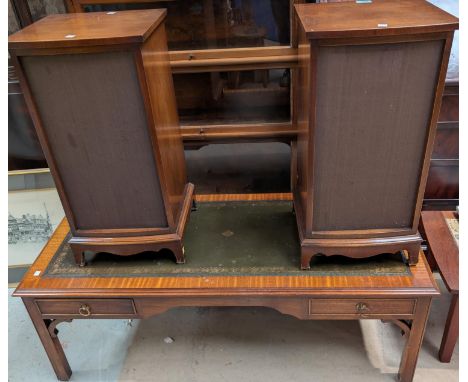 A reproduction mahogany coffee table with drawers and leather top, and a pair of Reprodux speaker cabinets