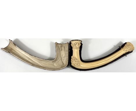 An elongated Meerschaum pipe bowl with relief acanthus and shell decoration (no mouthpiece) length 22cm