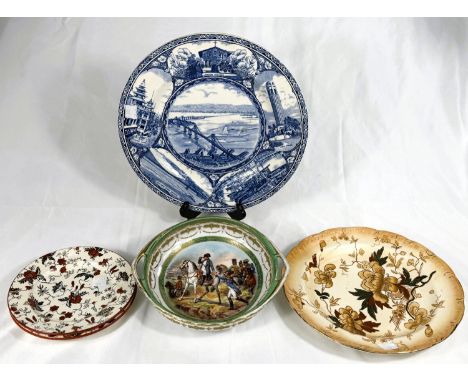 A circular Dresden-style polychrome circular dish depicting Napoleon on horseback with soldiers, length 20cm; decorative plan