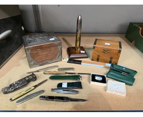 An early 20th Century shelf on plinth, Arts and Crafts box, pocket knives etc.