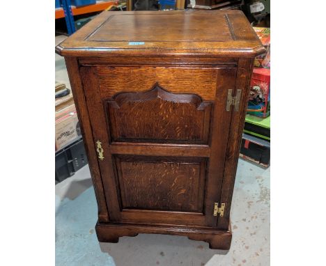 An oak Titchmarsh and Goodwin style cabinet and a similar shelf unit