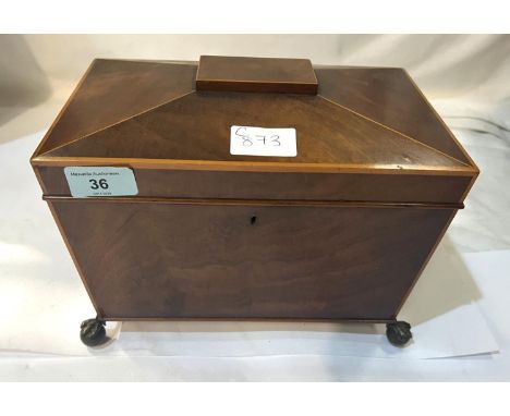 A Sheraton period mahogany Sarcophagus-shaped tea caddy with boxwood banding; double fitted interior, lion mask handles and b