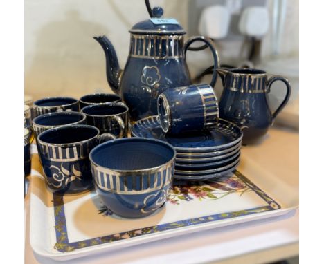 An Art Deco Wedgwood coffee set dark blue ground with silver flower and line decoration 6 cups and saucers, sugar, milk and c