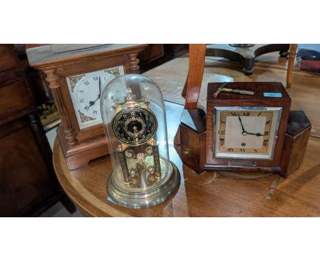 An Art Deco Armstrong of Manchester mantel clock; another mantel clock with white dial and a 400 day clock