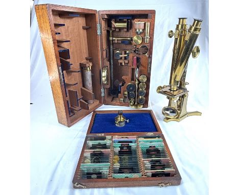 A 19th century binocular microscope numbered 2690, in mahogany case,&nbsp; various lenses and accessories including free stan