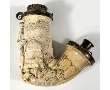 A very large Meerschaum pipe bowl with silver metal mounts, decorated in relief with a huntsman and dogs chasing rabbits.&nbs