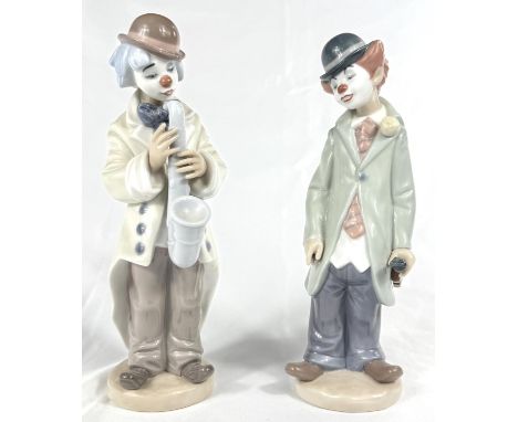 A Lladro clown/musician with saxophone; a child clown with balloons' a child clown with fiddle.