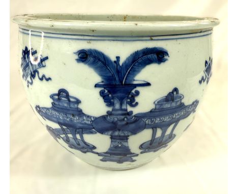 A Chinese fish bowl/planter with blue and white decoration, panels of vases and trees and birds, height 18cm x 22.5cm wide.