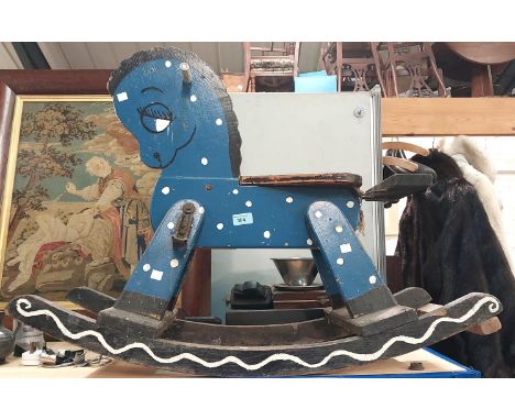 A small vintage blue painted rocking horse with metal foot rests, height 63cm