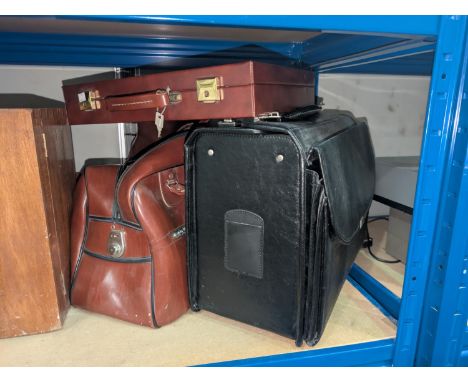 A briefcase type bag and other leather bags, etc.