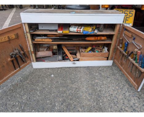 A teak tool cabinet and a collection of small files and smaller tools; a larger tool cabinet and tools, planes, saws etc.
