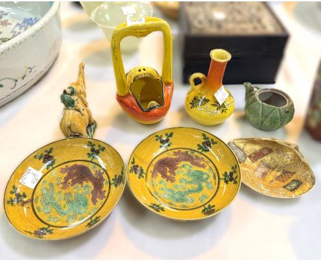 A pair of Chinese yellow dishes decorated with dragons with six-character mark to bases, and a selection of other oriental ce