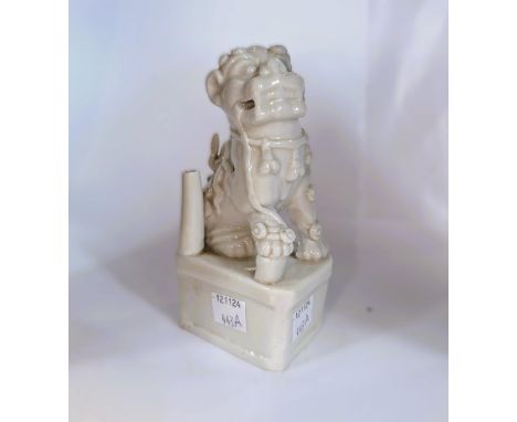A 17th/18th century Chinese blanc de chine Dehua Buddhistic Lion joss stick holder, ht. 13.5cm