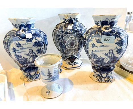 A set of 3 late 18th century Delft vases of tapering form, decorated in under glazed blue with flowers and chinoiserie landsc