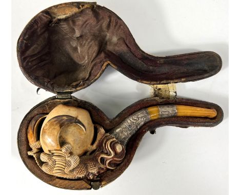A cased amber and Meerschaum pipe with chased silver mounts &amp; a very realistic claw &amp; egg bowl, length 16cm.