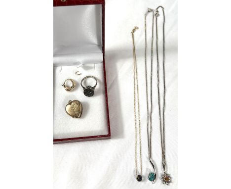A gold plated heart shaped locket, a fine 9ct gold chain necklace with black micro stone charm; 2 necklaces with pendants and