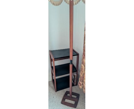 A mid-20th Century teak standard lamp with squared base, ebonised centre and round square column; a teak mid-century bookcase