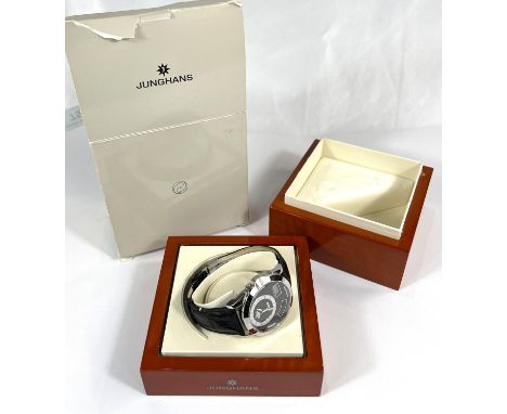 A Junghas Radio Controlled World Timer watch with stainless steel case and leather strap, with box.