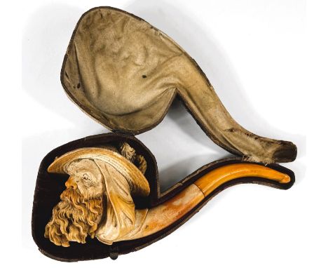 A large cased&nbsp;amber and Meerschaum pipe depicting a bearded man's head with feathered hat (stem slight crack + crack to 