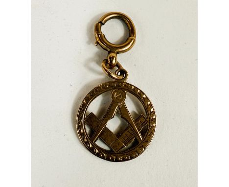 A Masonic square and compass 9ct hallmarked gold medallion, 3.3gm.