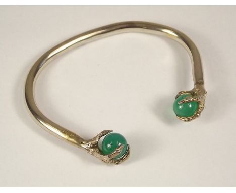 TORQUE BANGLE.
A hallmarked silver claw torque bangle.