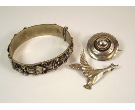 COSTUME JEWELLERY.
Two silver brooches & a silver plated bangle.