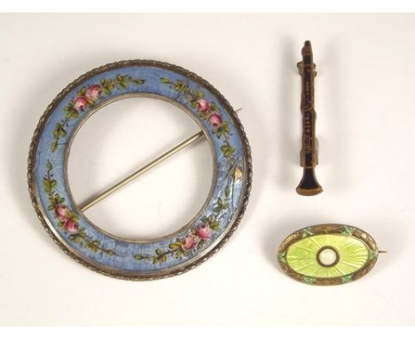 MARIUS HAMMER ETC.
A Marius Hammer small green enamelled brooch, a German enamelled roundel brooch & an H.W. Miller, B'ham en