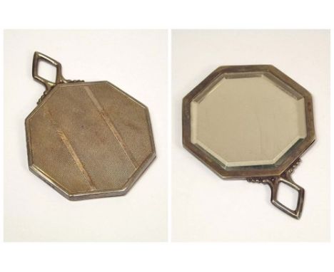 SILVER MIRROR ETC.
An engine turned silver handbag mirror, with leather purse. Import mark for London 1928. 5.5cm