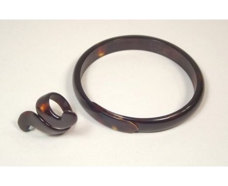TORTOISESHELL.
A tortoiseshell bangle & similar ring.