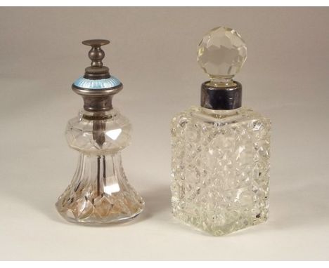 ATOMISER ETC.
A silver & enamel mounted atomiser & a silver mounted scent bottle.