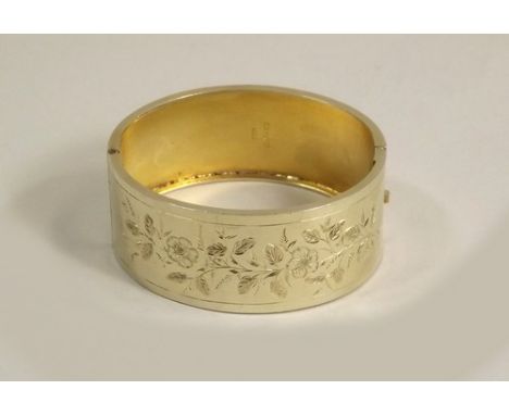 VICTORIAN BANGLE.
A Victorian silver gilt bright cut bangle. Birmingham 1883.