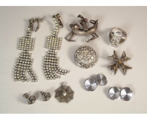 SILVER BUTTON ETC.
An Edwardian silver button, a pair of 1960's Adrien Mann paste set drop earrings, marcasite earrings etc.