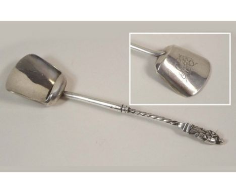CADDY SPOON.
A George III Apostle caddy spoon, by Joseph Taylor. Birmingham 1807. Length 13cm.
